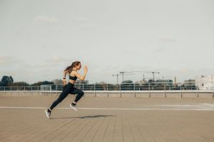 a girl running for her workout